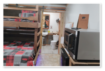 the bedroom in one of our cabins